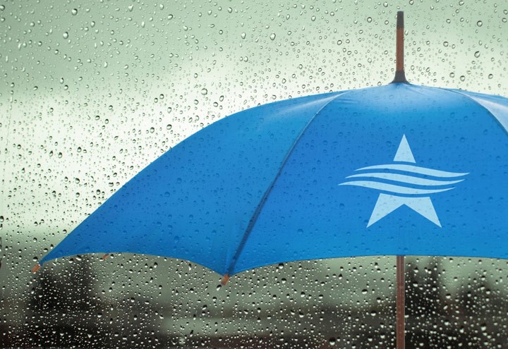 Image of rain on an umbrella with the TSB logo