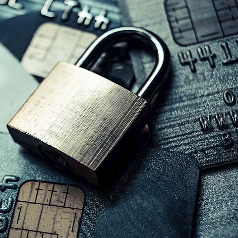 Image of lock with debit cards