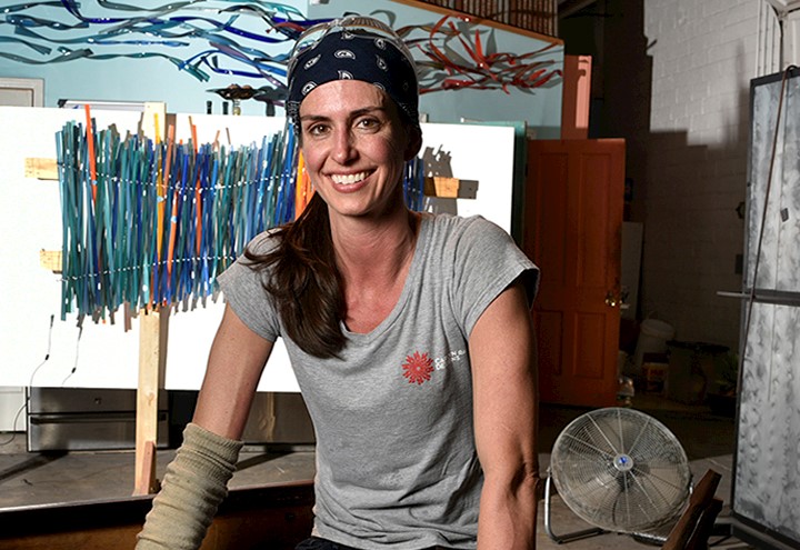 Photo of Carlyn Ray in her design studio